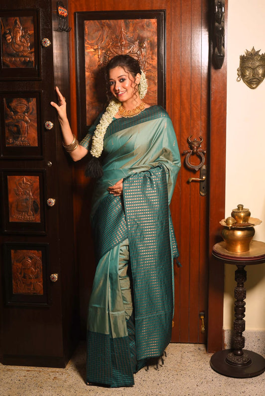 Green Soft Silk Saree With Contrast Fancy Zari Weaves Border