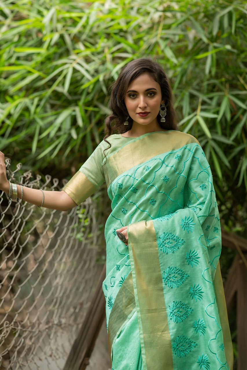 Teal Aasam Silk Embroidered Saree