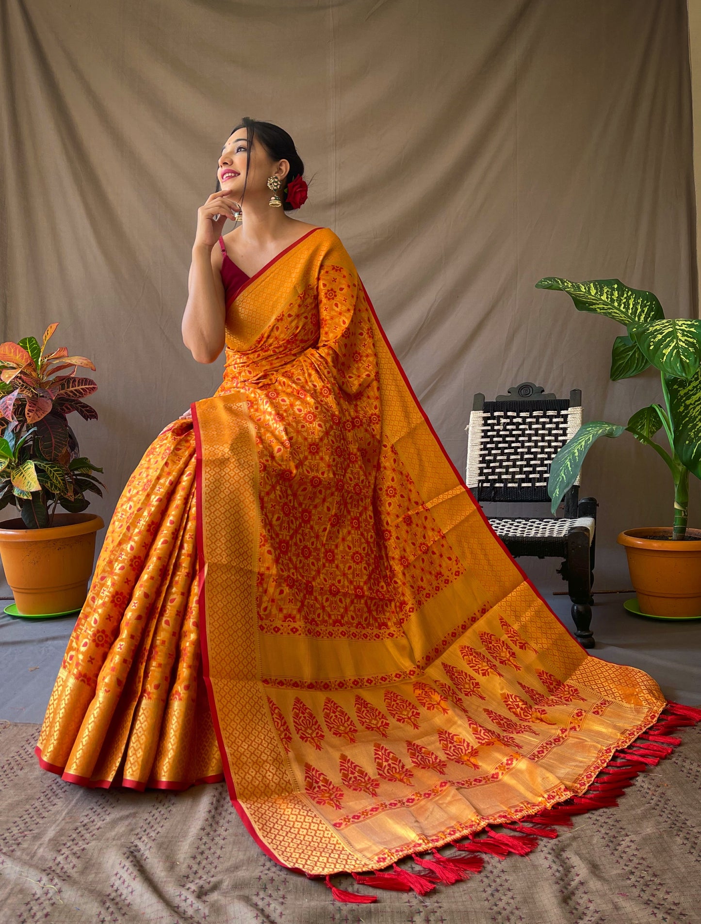Orange Gold Zari And Meenakari Patola Sarees