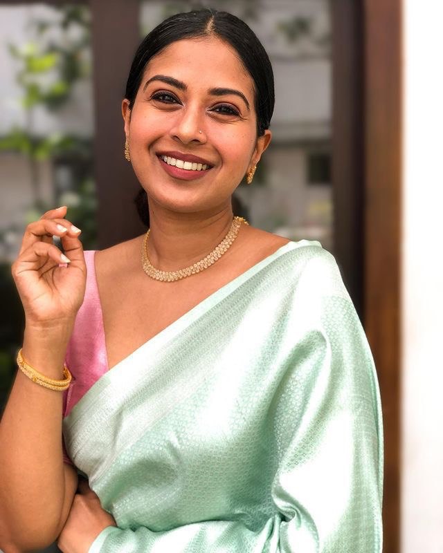 C-Green Lichi Silk Banarasi Saree With Silver Weaving