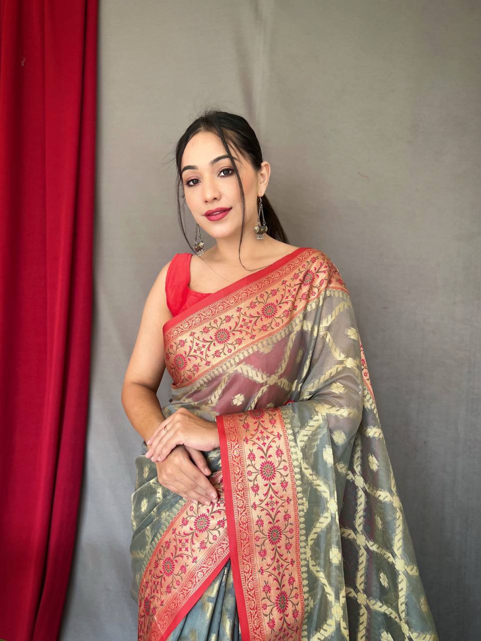 Grey Pure organza weaved saree with Jacquard border.