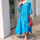 Chic in Blue: Effortless Elegance with a Pop of Red Dress