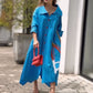 Chic in Blue: Effortless Elegance with a Pop of Red Dress