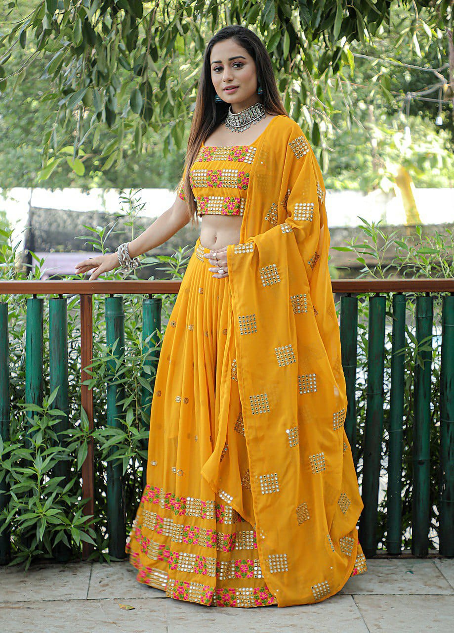 Mustered  Embroidered Faux Georgette Party Wear Lehenga Choli