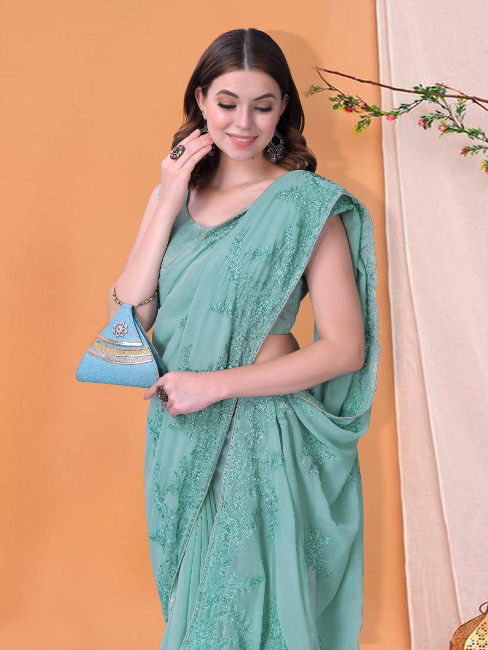 Blue Georgette Embroidered Work Saree With Piping Border