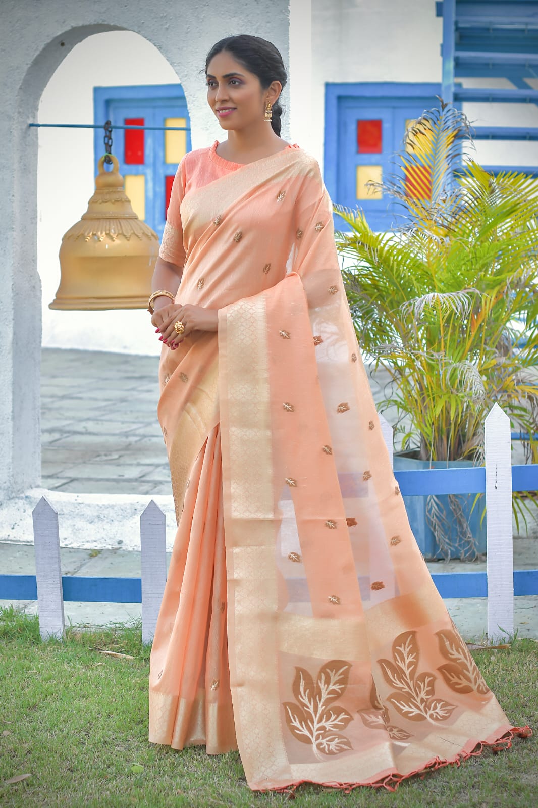 Linen Peach Tissue Saree With Zari Border