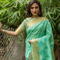 Teal Aasam Silk Embroidered Saree