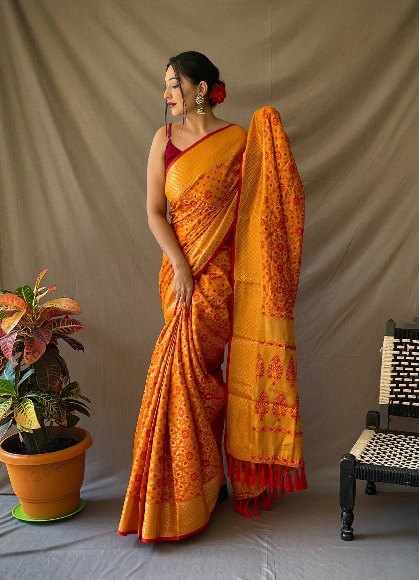 Orange Gold Zari And Meenakari Patola Sarees
