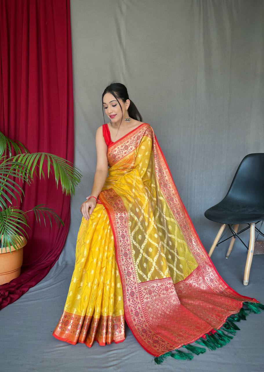Yellow Pure organza weaved saree with Jacquard border.