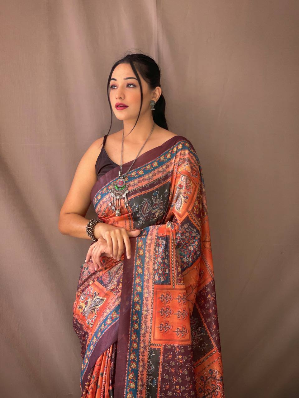 Orange Kalamkari Print Saree With Tassles Attached