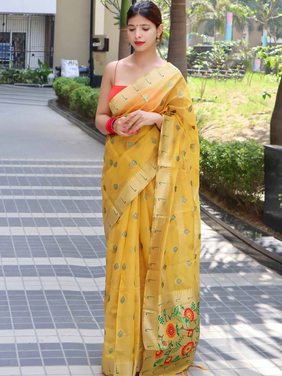 Yellow Paithani Saree With Zari Weaving Border.