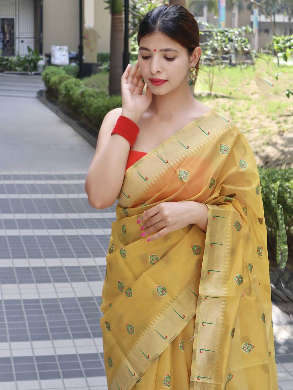 Yellow Paithani Saree With Zari Weaving Border.